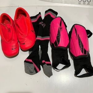 Pink Nike soccer started set cleats size 12.5c and child size shin guards/socks